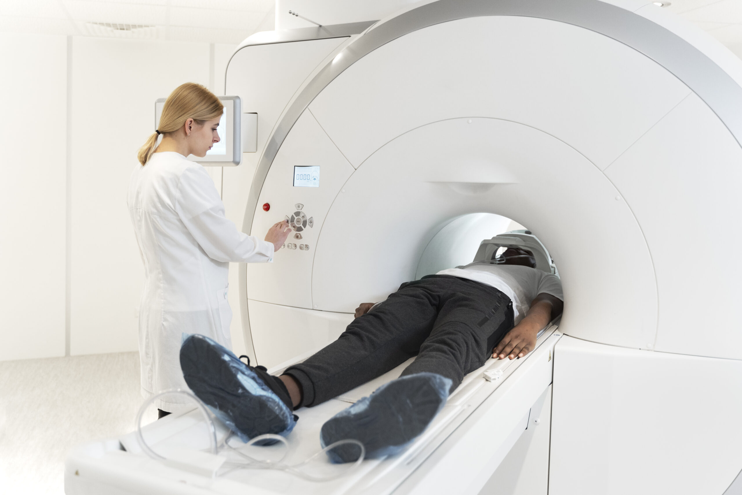 https://medventuremexico.com/wp-content/uploads/2025/02/high-angle-young-doctor-pressing-ct-scan-buttons-scaled.jpg